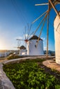 Traditional greek windmills on Mykonos island at sunrise, Cyclades, Greece Royalty Free Stock Photo