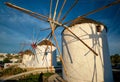 Traditional greek windmills on Mykonos island at sunrise, Cyclades, Greece Royalty Free Stock Photo