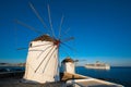 Traditional greek windmills on Mykonos island at sunrise, Cyclades, Greece Royalty Free Stock Photo