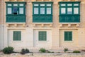 Traditional green balconies. Social housing, Valletta Malta Royalty Free Stock Photo