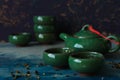 Traditional green Chinese teapot and cups Royalty Free Stock Photo