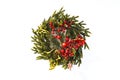 traditional green christmas wreath with holly berry isolated on white background. festive decoration, beautiful spruce wreath with Royalty Free Stock Photo