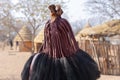 Traditional hairstyle of women in the Himba tribe photographed from behind. The Himba people are indigenous african tribe living Royalty Free Stock Photo