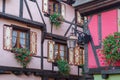 Facade of half timbered houses in Riquewihr village, France Royalty Free Stock Photo