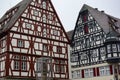 Traditional half-timbered houses on narrow medieval street in Rothenburg ob der Tauber, Bavaria, Germany. November 2014 Royalty Free Stock Photo