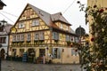 Traditional half-timbered houses on narrow medieval street in Rothenburg ob der Tauber, Bavaria, Germany. November 2014 Royalty Free Stock Photo