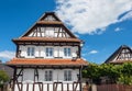 Traditional half-timbered houses in the streets of Hunspach in Alsace, France Royalty Free Stock Photo