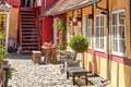 Traditional half-timbered yelow house in Svaneke. Royalty Free Stock Photo