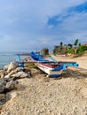 Fisherman boat piroga on the Indian ocean shore. Nusa dua, Bali, Indonesia