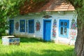 Traditional hand painted floral decorations on old wooden house in famous polish village Zalipie Royalty Free Stock Photo