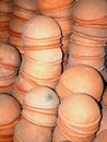 Traditional Handmade clay brown cups, pots and plates in Asian local market,Oriental bazaar. Old pottery. Exhibits ancient times Royalty Free Stock Photo