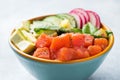 Traditional Hawaiian Poke salad with salmon, avocado rice and vegetables in a bowl Royalty Free Stock Photo