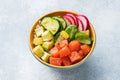 Traditional Hawaiian Poke salad with salmon, avocado rice and vegetables in a bowl Royalty Free Stock Photo