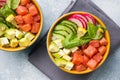 Traditional Hawaiian Poke salad with salmon, avocado rice and vegetables in a bowl on two persons. Top view Royalty Free Stock Photo