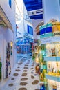 Cobbled commercial street boutiques of Chora Mykonos Cyclades Greece Royalty Free Stock Photo