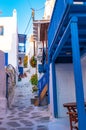 Traditional Hillside narrow cobbled street of Chora Mykonos town Cyclades Greece Royalty Free Stock Photo