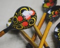 Traditional hohloma spoons. Ukrainian spoons made of wood, colorful Khokhloma painting.Wooden spoons - Khokhloma