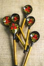 Traditional hohloma spoons. Ukrainian spoons made of wood, colorful Khokhloma painting.Wooden spoons - Khokhloma
