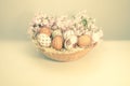 Traditional holiday - Easter. Eggs in a basket. Wireworking.Vintage. Royalty Free Stock Photo