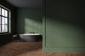 Traditional home bathroom interior with bathtub, table and window. Mockup wall Royalty Free Stock Photo