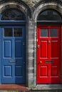 Traditional home door in England in red and blue Royalty Free Stock Photo