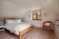 Traditional home interior bedroom with high sloping ceiling
