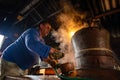 Traditional home made brandy distillery in country side of Romania, Horinca making in Maramures County Royalty Free Stock Photo