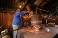 Traditional home made brandy distillery in country side of Romania, Horinca making in Maramures County Royalty Free Stock Photo