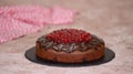 Traditional homemade chocolate cake sweet pastry dessert with brown icing, cherries. Royalty Free Stock Photo