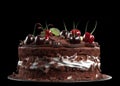 Traditional homemade chocolate cake sweet pastry dessert with brown icing, cherries, raspberry Royalty Free Stock Photo