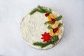 Traditional homemade christmas cake holiday dessert with berry, winter pie on gray table background. Rustic style. Top view