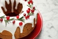 Traditional homemade Christmas cake on white marble table, closeup Royalty Free Stock Photo