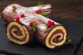 Traditional homemade Christmas cake. Yule log or Buche de Noel. Royalty Free Stock Photo