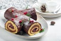 Traditional homemade Christmas cake. Yule log or Buche de Noel. Sponge cake Royalty Free Stock Photo