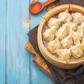 Traditional homemade dumplings showcased on rustic wooden backdrop