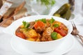 Traditional homemade Hungarian beef meat stew and soup - Goulash with potatoes, carrots , tomatoes, bell pepper Royalty Free Stock Photo