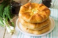 Traditional homemade Romanian and Moldovan pies - Placinta, served with wine. Rustic style.