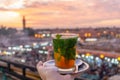 Moroccan mint tea at sunset on a rooftop cafe in Marrakech Royalty Free Stock Photo