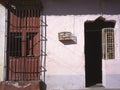 Traditional house with bird cage in Trinidad Royalty Free Stock Photo