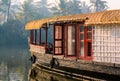 Traditional house boatan jungle in the Backwaters lake, Kerala, India Royalty Free Stock Photo