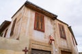 A traditional house with a prominent hanging chair and beautiful wooden windows in the old city of Nicosia, Cyprus Royalty Free Stock Photo