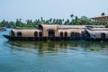 Traditional Houseboat seen sailing through the picturesque backwaters of Allapuzza or Alleppey in Kerala /India Royalty Free Stock Photo