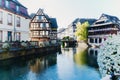 Traditional houses on beautiful canals in La Petite France medieval fairytale town of Strasbourg, UNESCO World Heritage Site, Royalty Free Stock Photo