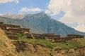 Traditional Houses on the Green Forest Rocks in Pakistani Mountains Royalty Free Stock Photo