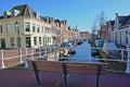 Traditional houses, located along Bakenessergracht Canal and viewed from Korte Jansbrug bridge in Haarlem Royalty Free Stock Photo