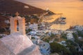 Traditional houses, wind mills and churches in Ios island, Cyclades, Greece. Royalty Free Stock Photo