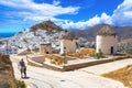 Traditional houses, wind mills and churches in Ios island, Cyclades.