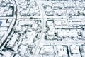 Traditional housing estate in the suburbs in snowy winter day. aerial photo