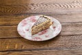 Traditional Hungarian Esterhazy cake with almond and chocolate  on wooden background Royalty Free Stock Photo