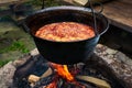 Traditional Hungarian Goulash soup in cauldron Royalty Free Stock Photo